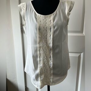 Sleeveless sheer blouse